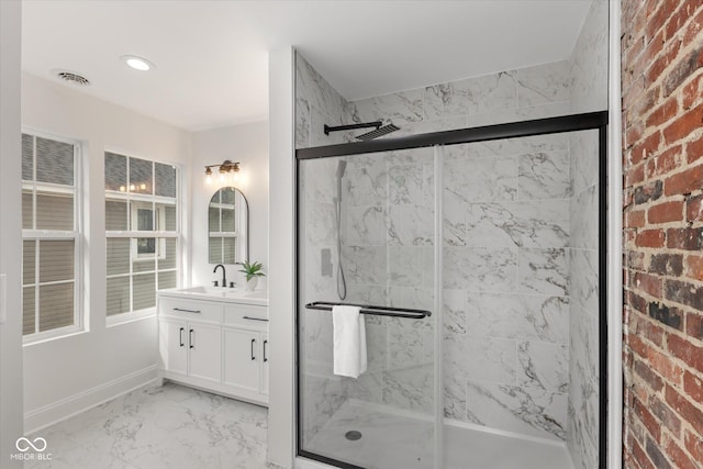 625 N Parker Ave, Indianapolis, IN 46201 - full bath featuring marble finish floors, a stall shower, and vanity