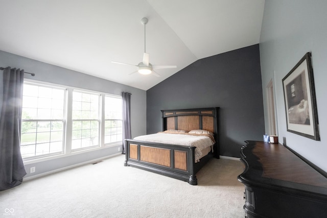 carpeted bedroom with baseboards, ceiling fan, vaulted ceiling, and visible vents