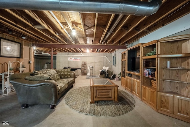 living area featuring concrete flooring