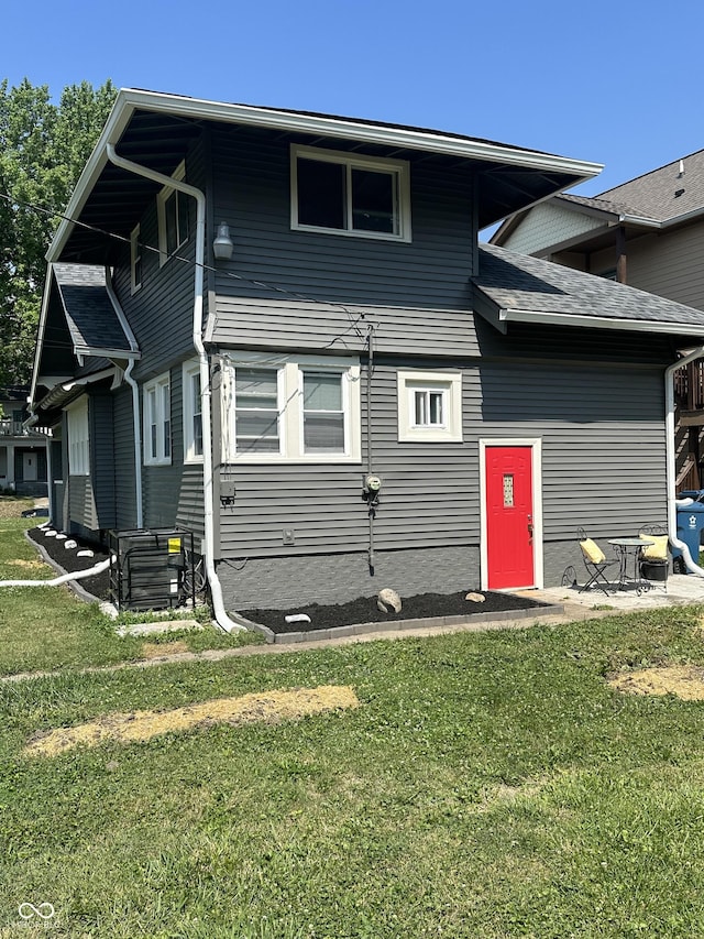 4205 Rookwood Ave, Indianapolis, IN 46208 - rear view of house featuring a lawn