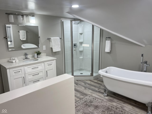 4205 Rookwood Ave, Indianapolis, IN 46208 - bathroom featuring a shower stall, vanity, a soaking tub, and wood finished floors