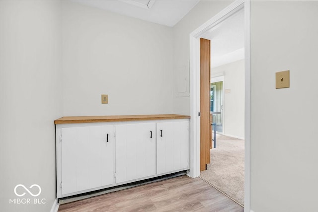 1632 Queensbridge Sq Unit 7, Indianapolis, IN 46219 - hall with light wood-type flooring and baseboards