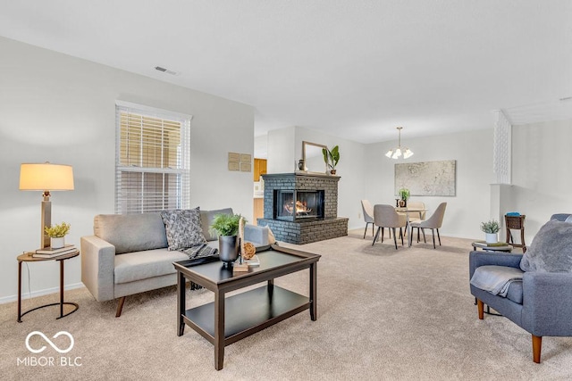 1632 Queensbridge Sq Unit 7, Indianapolis, IN 46219 - living area with light carpet, a chandelier, a brick fireplace, and baseboards