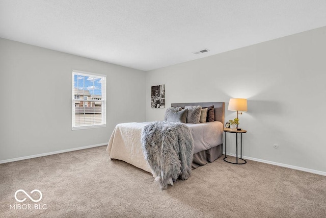 1632 Queensbridge Sq Unit 7, Indianapolis, IN 46219 - carpeted bedroom featuring baseboards