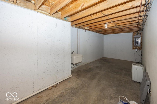 unfinished below grade area with a sink