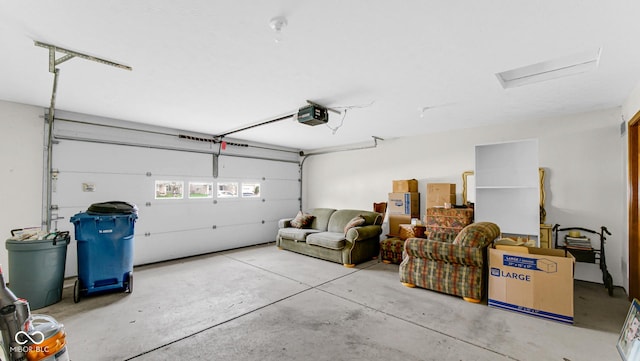 garage featuring a garage door opener
