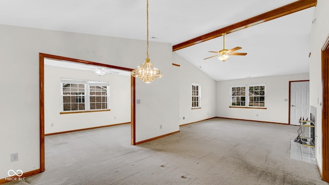 unfurnished living room featuring ceiling fan with notable chandelier, baseboards, and lofted ceiling with beams