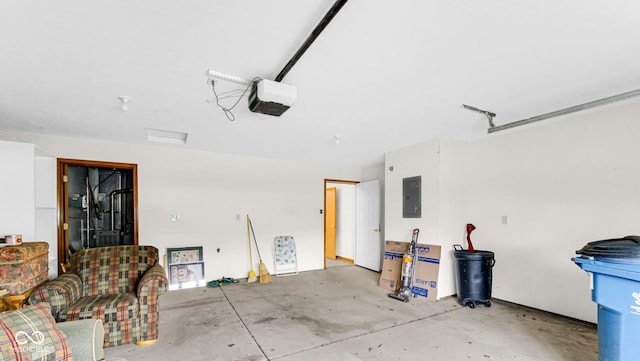 garage featuring a garage door opener and electric panel