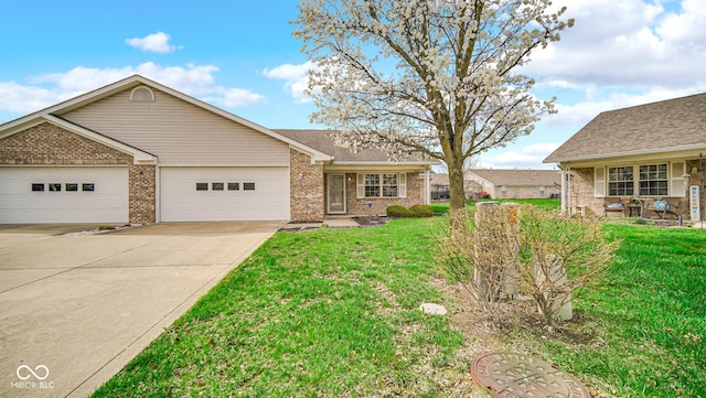 ranch-style house with brick siding, a front lawn, an attached garage, and concrete driveway