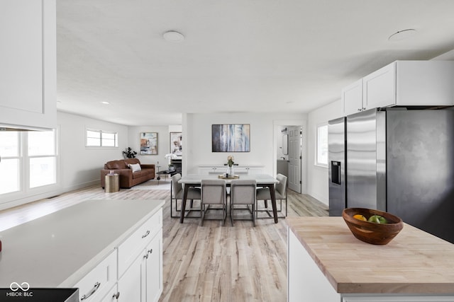 dining room featuring light wood-type flooring