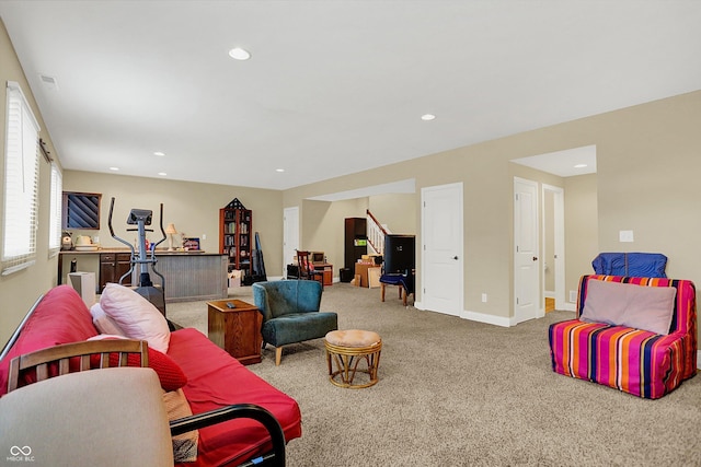 living area with carpet floors, recessed lighting, and baseboards