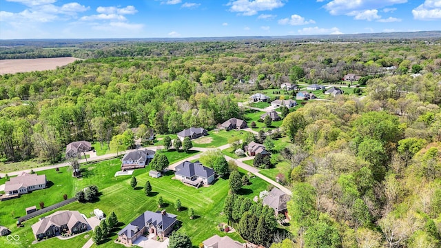 aerial view with a residential view and a forest view