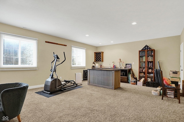 home office featuring a bar, recessed lighting, baseboards, and light carpet