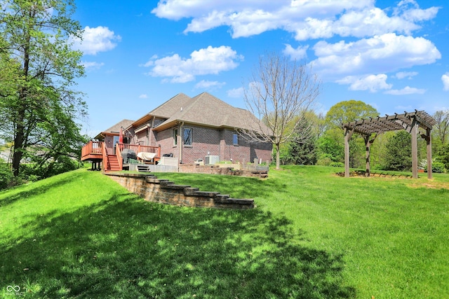 view of yard with a pergola and a deck