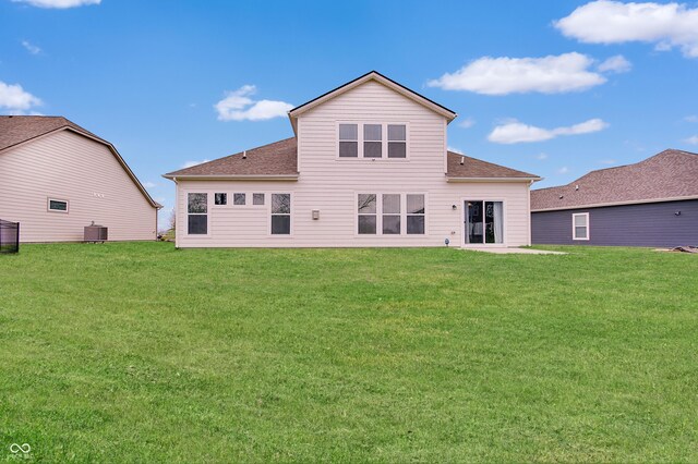 3799 Hoosier Down Dr, Bargersville, IN 46106 - rear view of property featuring central AC, a yard, and a shingled roof