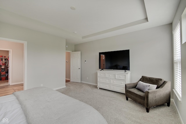3799 Hoosier Down Dr, Bargersville, IN 46106 - bedroom featuring a walk in closet, light carpet, a closet, and baseboards