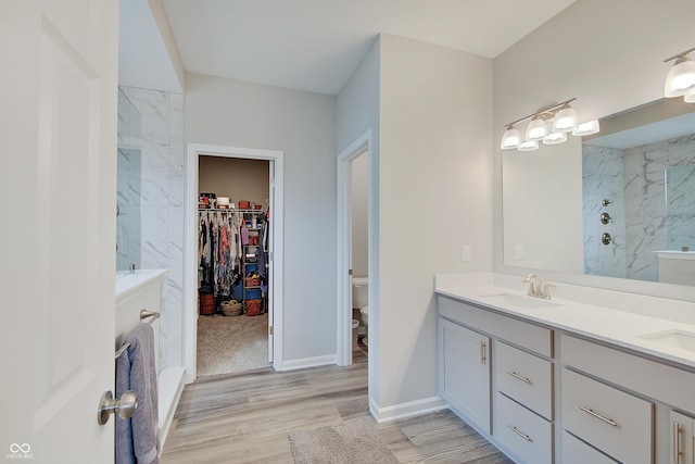 3799 Hoosier Down Dr, Bargersville, IN 46106 - full bath with double vanity, toilet, wood finished floors, and a sink
