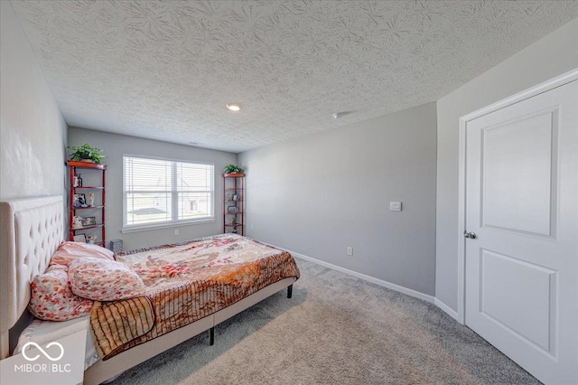 5839 Altar Bell Cir, Greenwood, IN 46143 - carpeted bedroom featuring baseboards and a textured ceiling