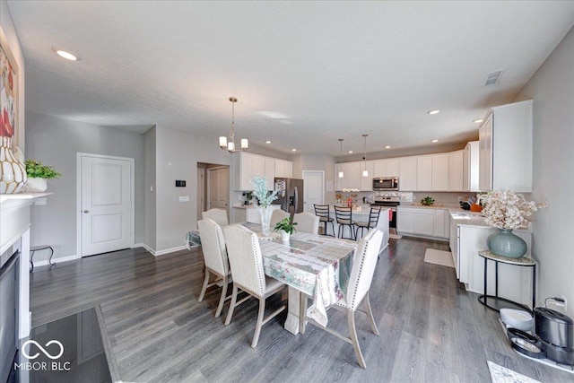 5839 Altar Bell Cir, Greenwood, IN 46143 - dining room featuring visible vents, dark wood finished floors, baseboards, a chandelier, and recessed lighting