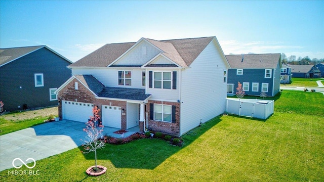 5839 Altar Bell Cir, Greenwood, IN 46143 - view of front of property featuring concrete driveway, brick siding, fence, and a front lawn