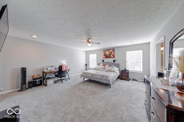 5839 Altar Bell Cir, Greenwood, IN 46143 - bedroom with light colored carpet, a ceiling fan, a textured ceiling, and baseboards