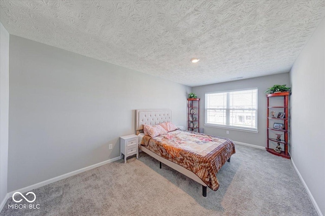 5839 Altar Bell Cir, Greenwood, IN 46143 - carpeted bedroom with baseboards and a textured ceiling