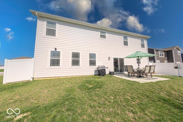 5839 Altar Bell Cir, Greenwood, IN 46143 - back of house with fence, a patio, and a lawn