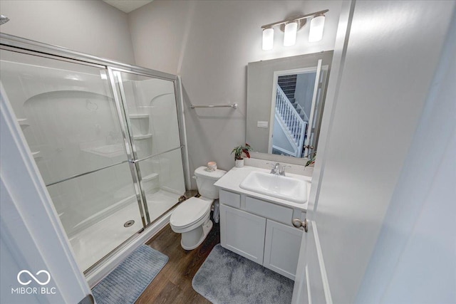 5839 Altar Bell Cir, Greenwood, IN 46143 - full bath with vanity, a stall shower, wood finished floors, and toilet