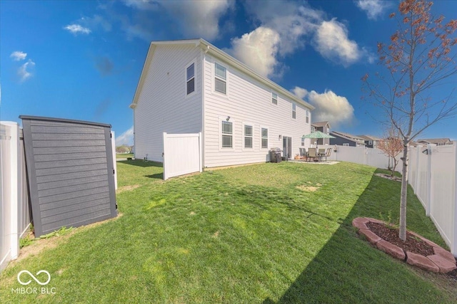 5839 Altar Bell Cir, Greenwood, IN 46143 - rear view of property with a fenced backyard, a patio, and a yard
