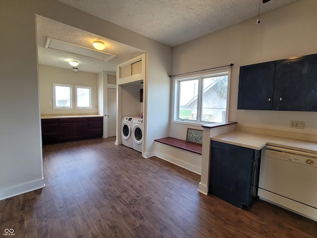 2628 N 150 E, Rushville, IN 46173 - interior space with baseboards, laundry area, a textured ceiling, attic access, and dark wood-type flooring