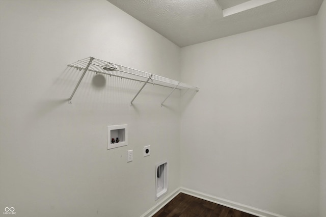 laundry area featuring baseboards, washer hookup, dark wood-style flooring, laundry area, and electric dryer hookup