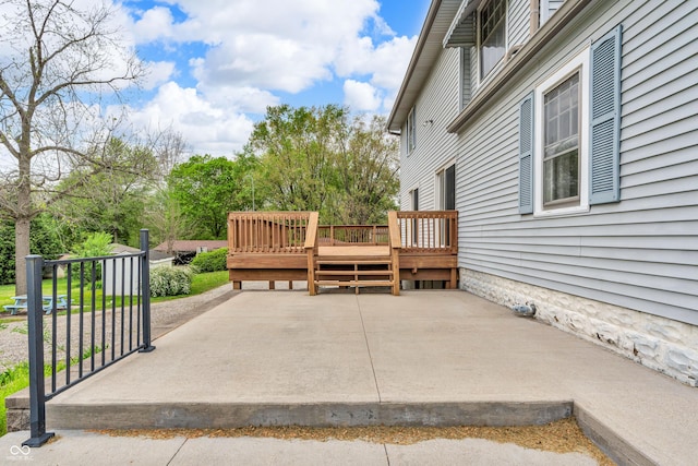 view of patio with a wooden deck