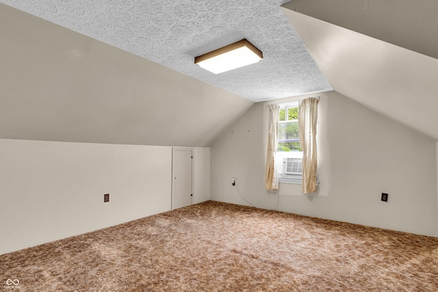 bonus room with carpet floors, vaulted ceiling, and cooling unit