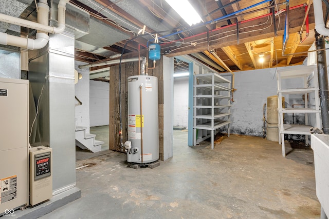 unfinished basement with stairs and gas water heater
