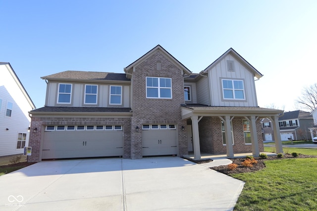 10543 Banyan Wood Ct, Indianapolis, IN 46239 - craftsman house featuring a garage, concrete driveway, board and batten siding, and brick siding