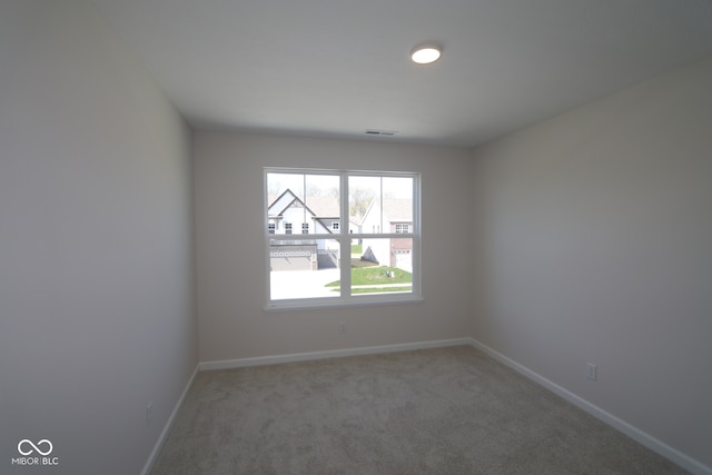 10543 Banyan Wood Ct, Indianapolis, IN 46239 - unfurnished room with baseboards and carpet