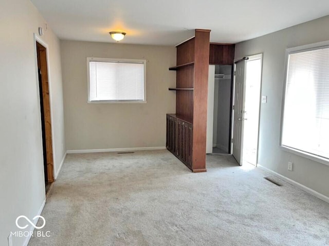2260 N Graham Ave, Indianapolis, IN 46218 - unfurnished living room with light carpet