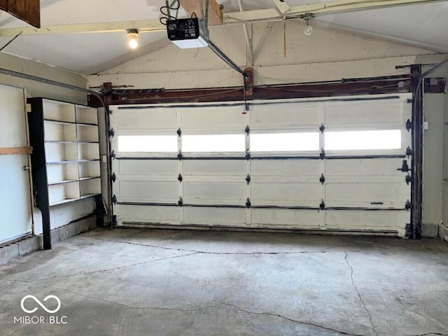 2260 N Graham Ave, Indianapolis, IN 46218 - garage featuring a garage door opener