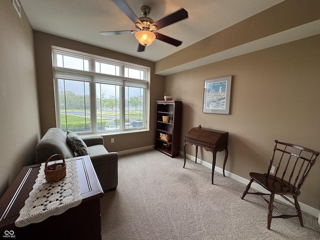 20971 Shoreline Ct Unit 214, Noblesville, IN 46062 - sitting room with baseboards, carpet flooring, a ceiling fan, and visible vents