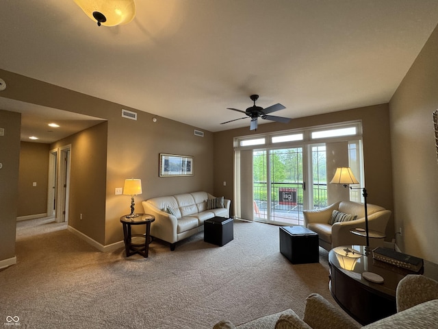 20971 Shoreline Ct Unit 214, Noblesville, IN 46062 - carpeted living area featuring a ceiling fan, baseboards, and visible vents
