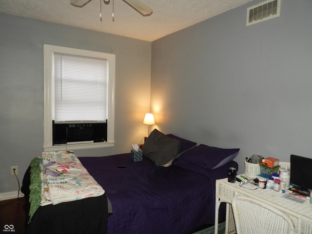 4920 E 34th St, Indianapolis, IN 46218 - bedroom featuring a textured ceiling and a ceiling fan