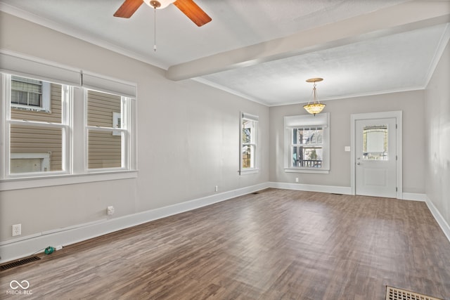 601 Wallace Ave, Indianapolis, IN 46201 - empty room featuring visible vents, baseboards, ornamental molding, ceiling fan, and wood finished floors