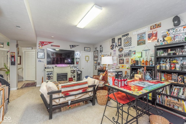 10518 Greenway Dr, Fishers, IN 46037 - carpeted dining area featuring a textured ceiling, a fireplace, and visible vents