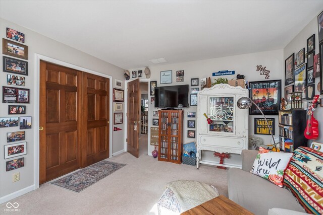 10518 Greenway Dr, Fishers, IN 46037 - living room featuring baseboards and carpet floors