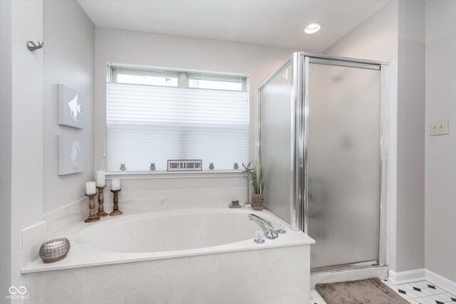 10518 Greenway Dr, Fishers, IN 46037 - full bath with tile patterned floors, a bath, and a stall shower