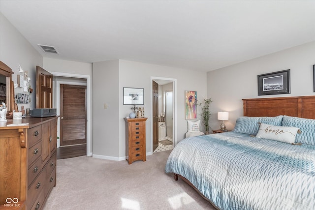 10518 Greenway Dr, Fishers, IN 46037 - bedroom featuring light colored carpet, baseboards, visible vents, and connected bathroom