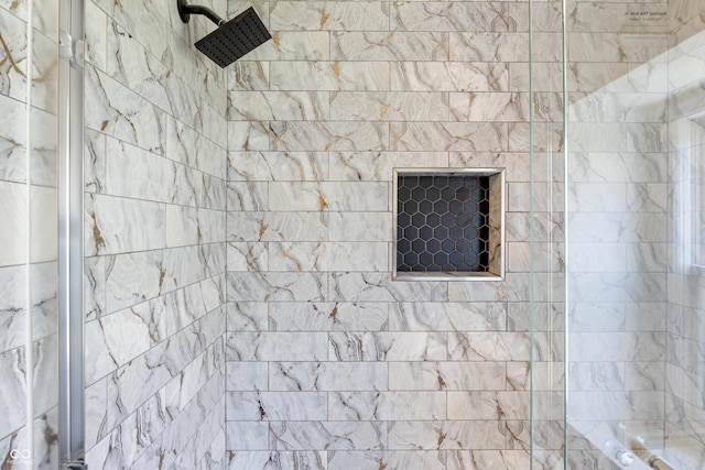 room details with a tile shower