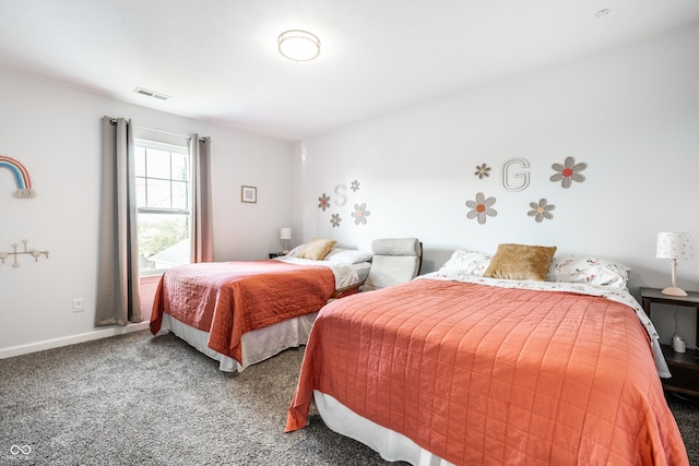 1603 E Market St, Indianapolis, IN 46201 - carpeted bedroom featuring baseboards and visible vents