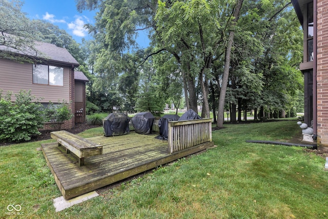102 Knoll Ct Unit D, Noblesville, IN 46062 - view of grassy yard featuring a deck