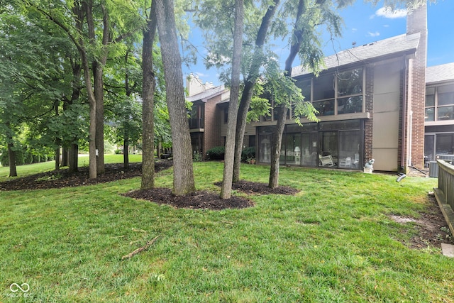 102 Knoll Ct Unit D, Noblesville, IN 46062 - view of grassy yard featuring a sunroom